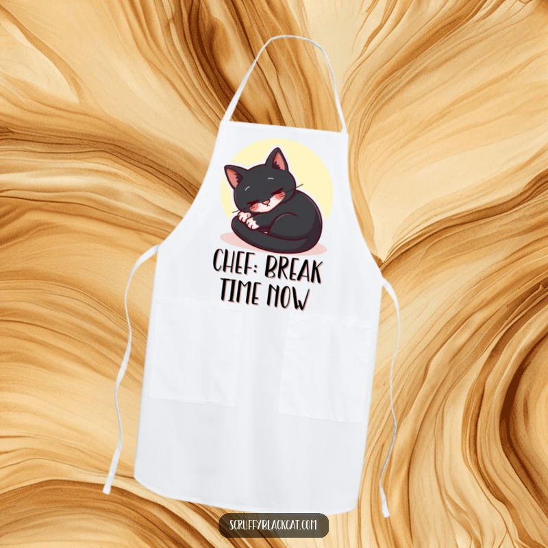 Funny black cat apron depicting a cat curled up purring contentedly in a sunbeam, ideal humorous kitchen wear.