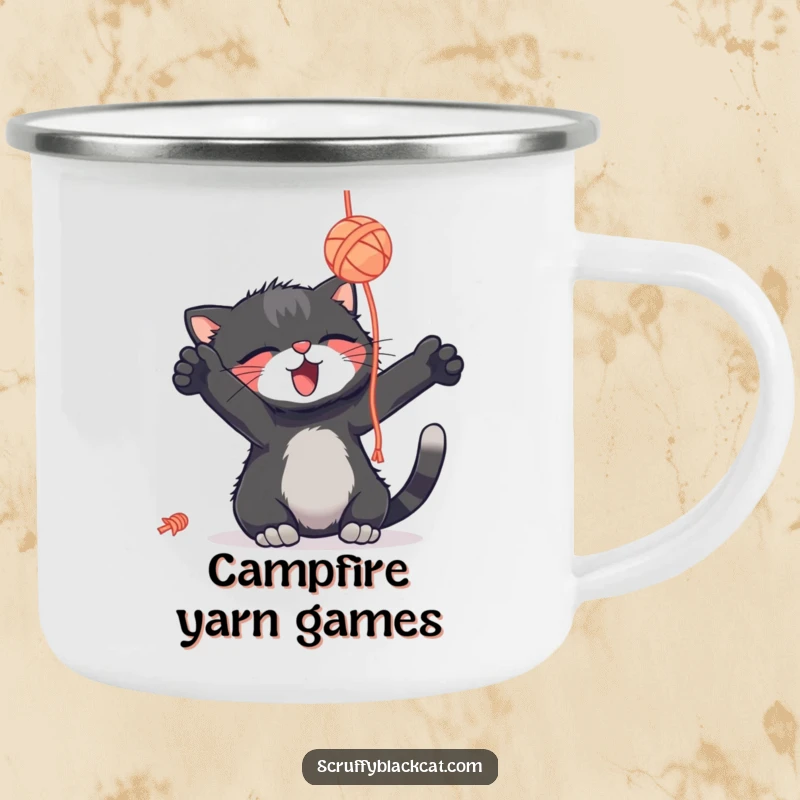 Funny scruffy black cat camping mug, batting a yarn ball with delight, durable for outdoor use, a funny gift.