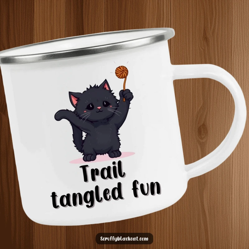 Funny kitten camping mug with a scruffy black kitten playing with a yarn ball, built for outdoor fun.