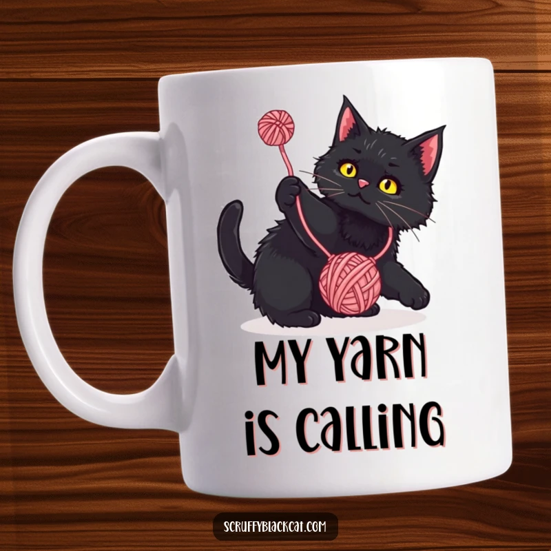Funny Mug: Scruffy black cat playfully batting at a dangling yarn ball, a humorous and delightful cat lover's gift.