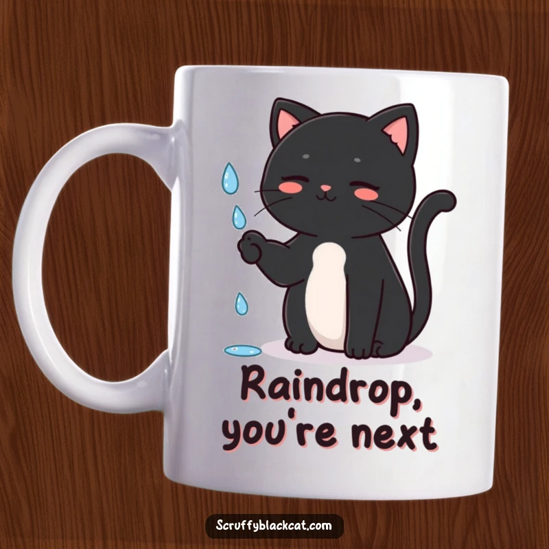 Funny Cat Mug showing a black cat sitting upright, batting playfully at a falling raindrop, capturing innocent curiosity, a great gift.