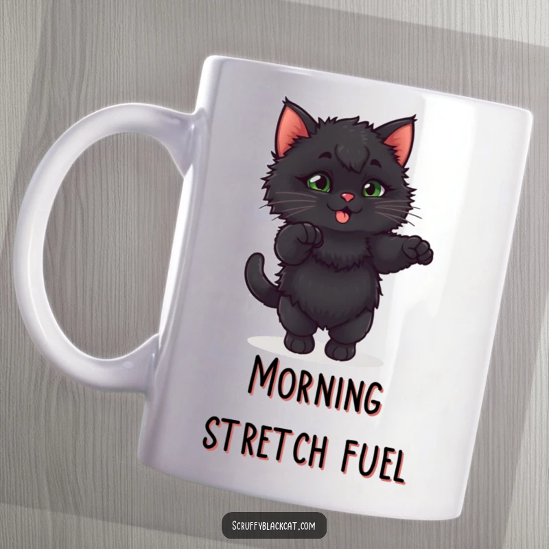 Funny fluffy black kitten doing an exaggerated, playful stretch on a delightful mug.