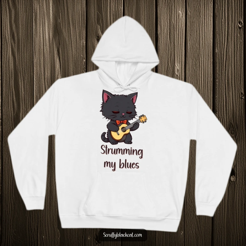 Funny black cat in a bow tie, strumming a tiny guitar, printed on a comfortable, warm hoodie.