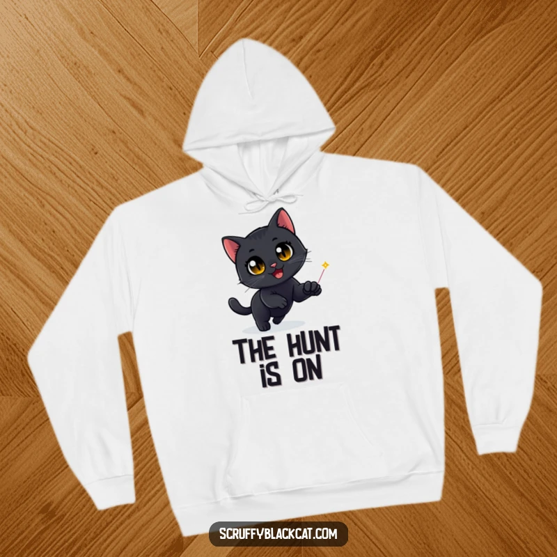 Funny Black Cat Hoodie: A black cat, eyes wide with delight, furiously chases a bright red laser dot, embodying playful energy.