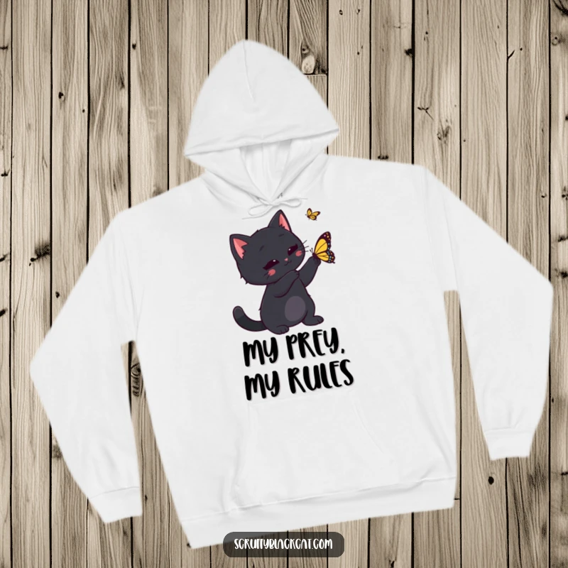 Funny black cat playfully swatting at a butterfly, printed on a warm hoodie, ideal for cat lovers who enjoy whimsical designs.