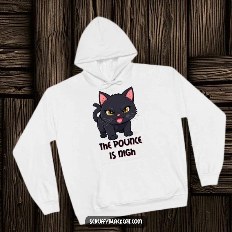 Funny Black Cat Hoodie: A black cat with a sly, mischievous grin is captured mid-crouch, ready to pounce with comedic intensity.