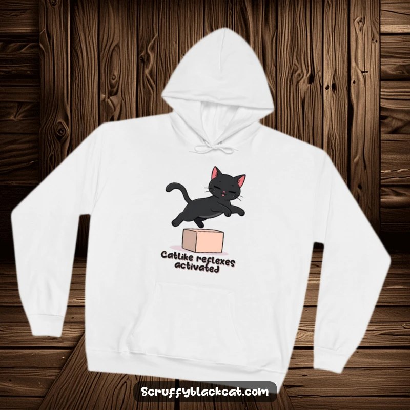 Funny black cat hoodie featuring a stylish black cat gracefully jumping over a small, bright block, radiating joy and movement.