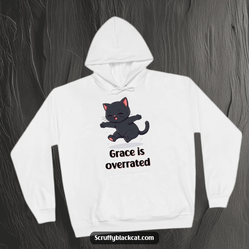 Funny black cat hoodie depicting a cat's failed graceful leap ending in a soft thud, great for cozy humor.