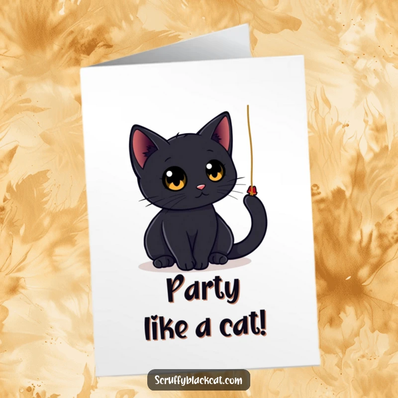 Funny Free Printable Birthday Card: A sleek black cat with large round eyes playfully bats at a dangling string, a cute downloadable.