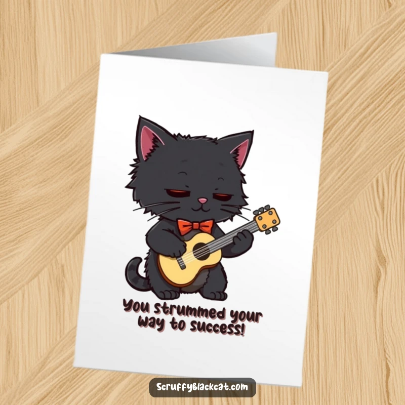 Free Printable Congratulations Card: A scruffy black cat wearing a bow tie plays a tiny guitar, looking suave.
