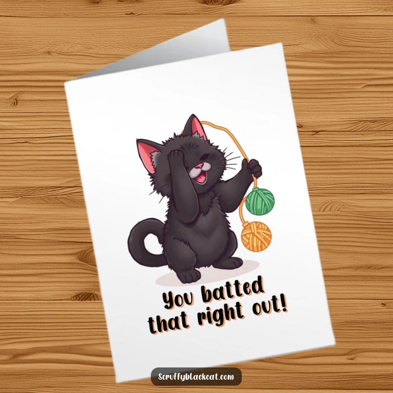 Funny Free Printable Congratulations Card: A scruffy cat batting at a yarn ball, perfectly celebrating your achievement.