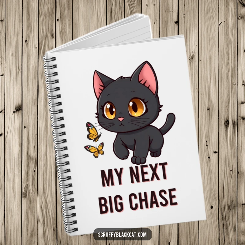 Funny black cat with curious eyes chasing a butterfly on the cover of a stylish notebook.