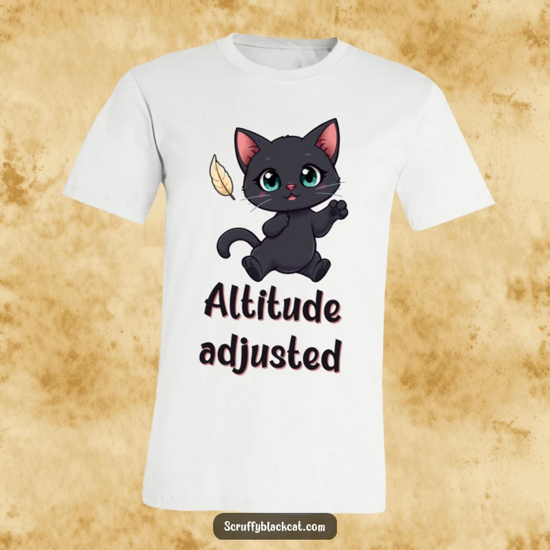 Funny t-shirt featuring a black cat with large, expressive eyes leaping for a floating feather, embodying playful focus.