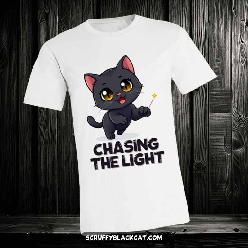 Funny Black Cat T-Shirt: A black cat with wide, ecstatic eyes intensely pursues a minuscule red laser dot across a vibrant background.