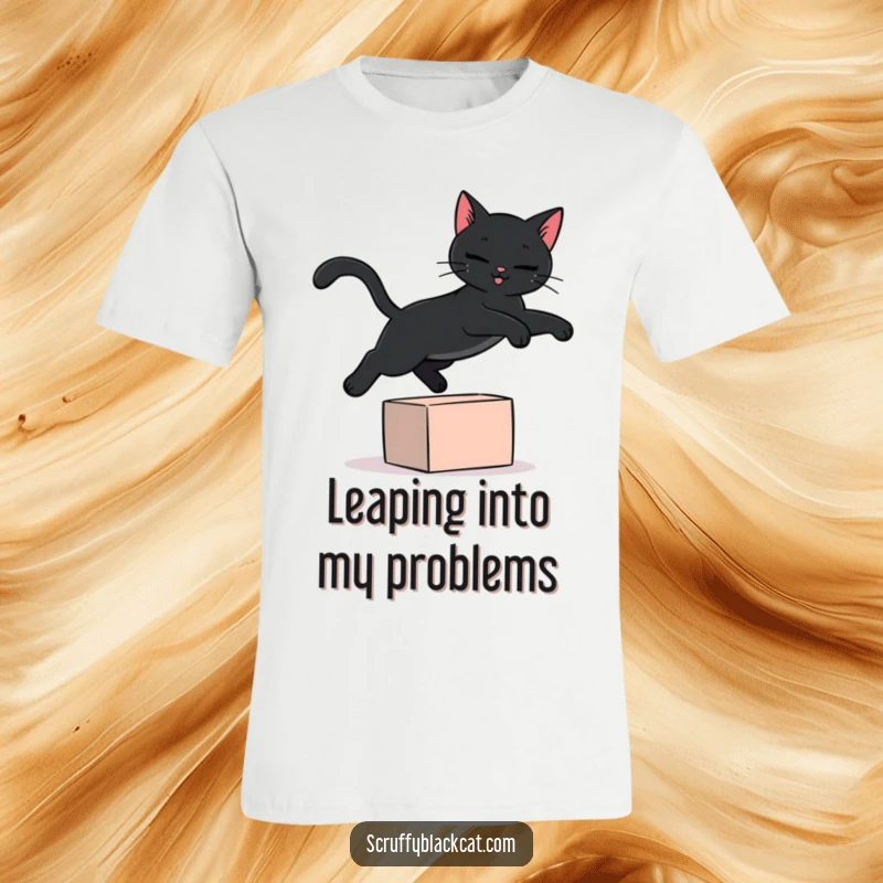 Funny black cat t-shirt depicting a sleek, dark cat in a dramatic leap over a small, colorful toy block, full of energy.