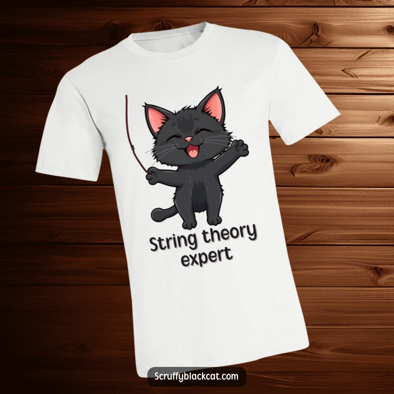 Funny Cat T-Shirt depicting a scruffy black cat gleefully batting a dangling string, full of playful mischief.