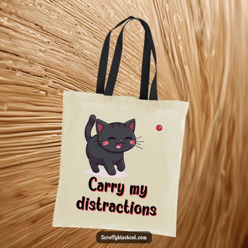 Funny black cat caught mid-chase, pursuing a red laser dot, on a durable and stylish tote bag.