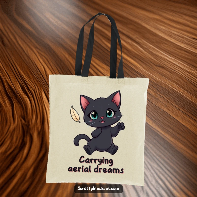 Funny tote bag featuring a big-eyed black cat leaping for a floating feather, perfect for carrying items with feline focus.